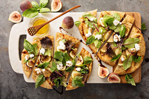 Pizza de figos, presunto e ricotta